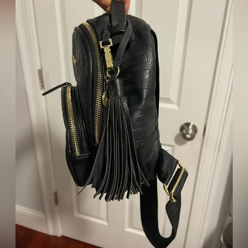 Steve Madden Black Mini Backpack with gold zipper